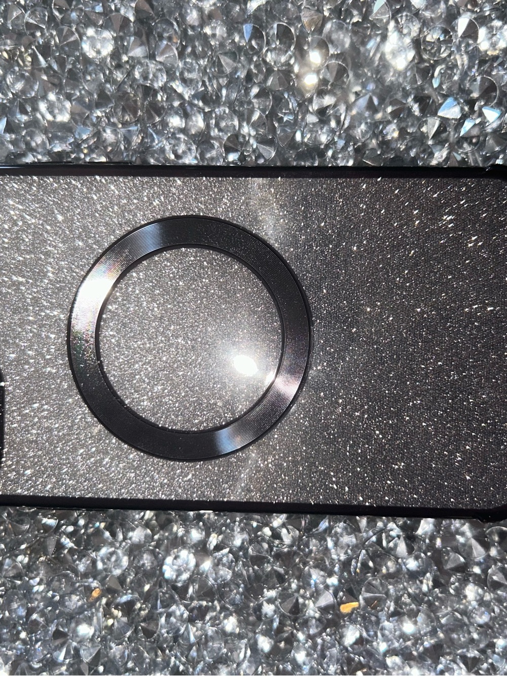 iPhone 15 plus Sleek Black Laptop Accessory Panel with Circular Port